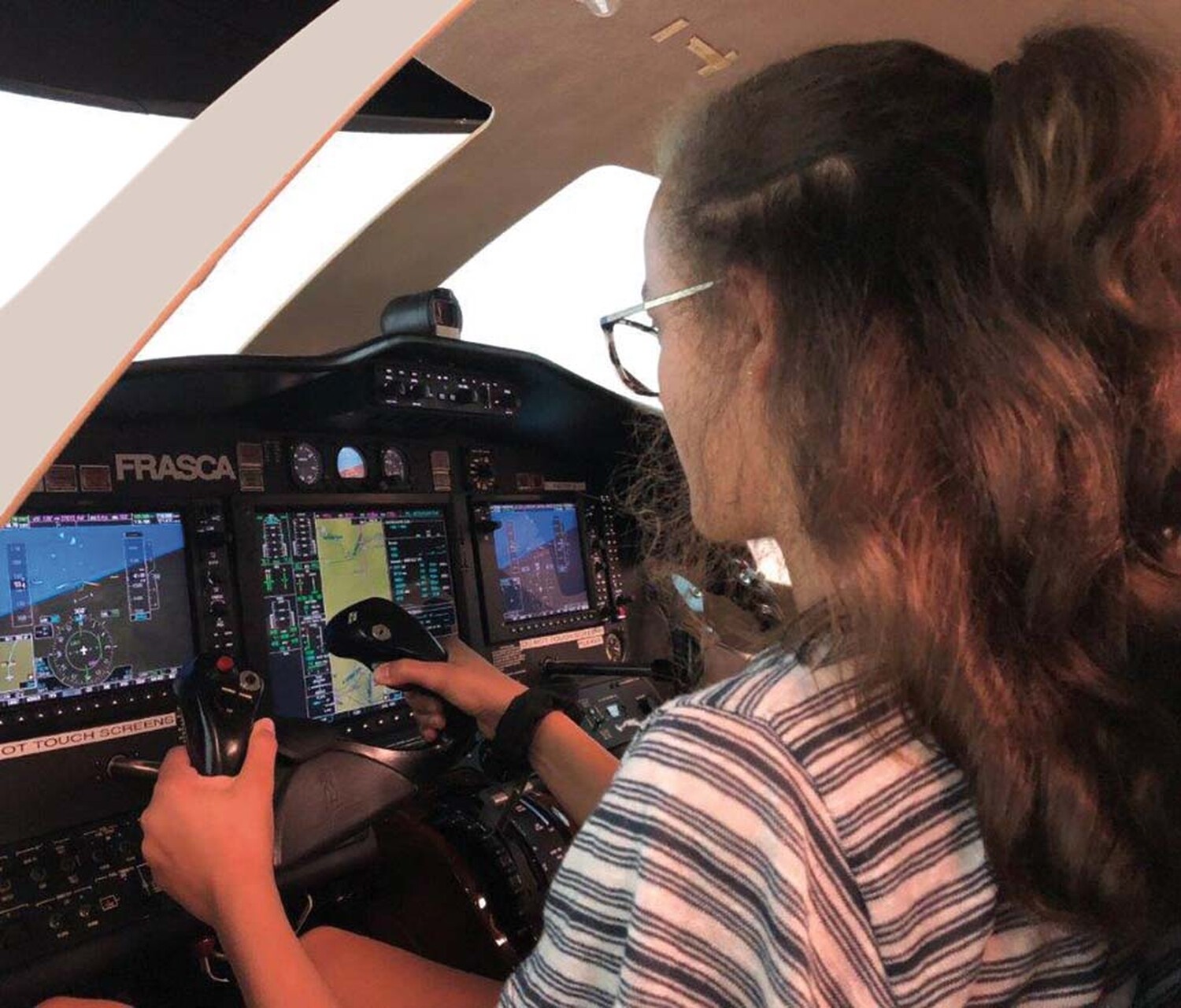 sfa-teen-girl-in-cockpit-T-2.jpg